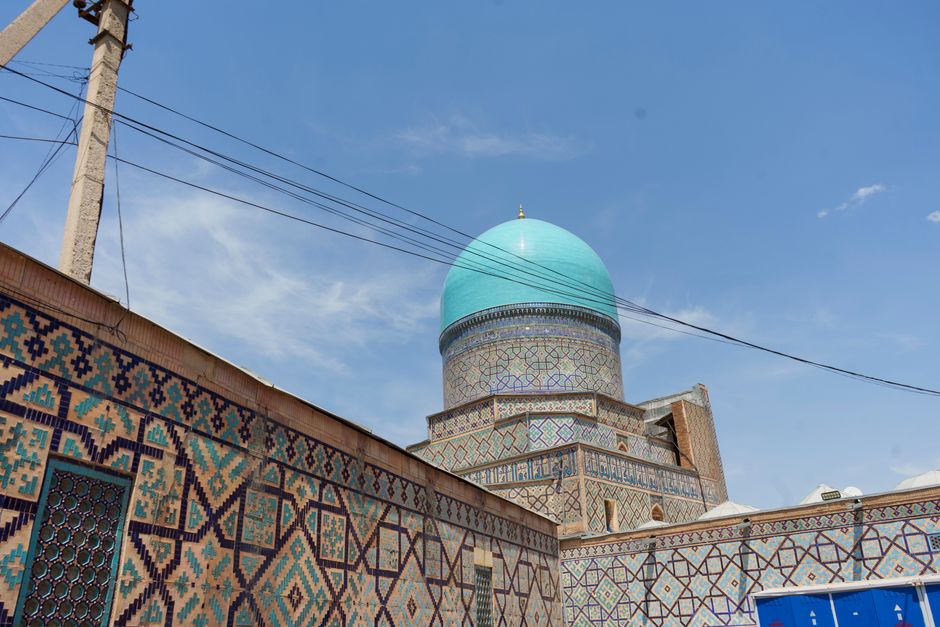 Vibrant mosaic dome showcasing Islamic architecture in Samarkand, Uzbekistan.
